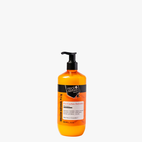 shampoing orange dans flacon rond en plastique avec pompe